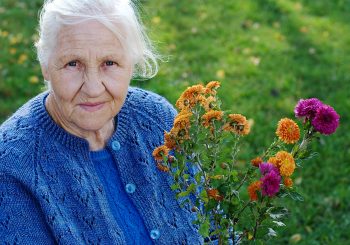 Senior Lady with flowers