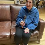 Memory Care Resident Singing at Monroe